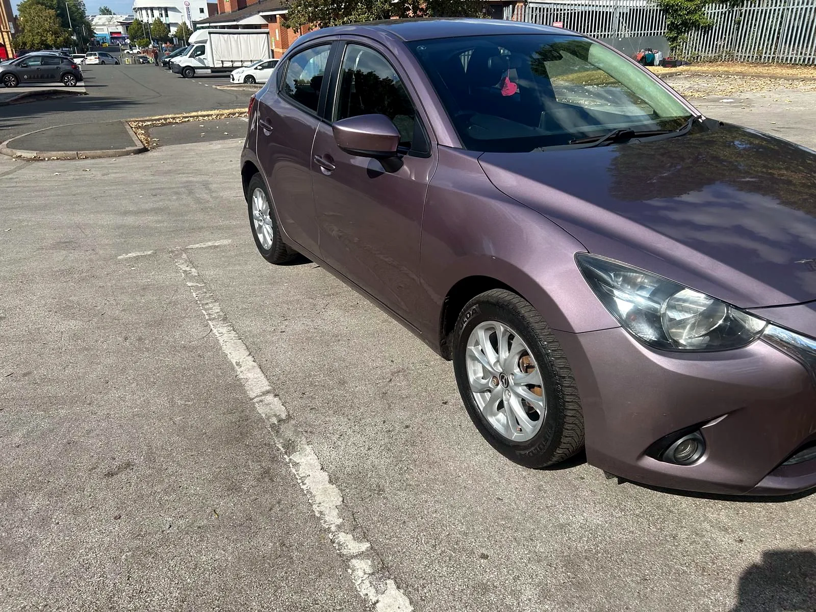 Mazda2 SE-L nearside exterior angle on genuine alloy wheels