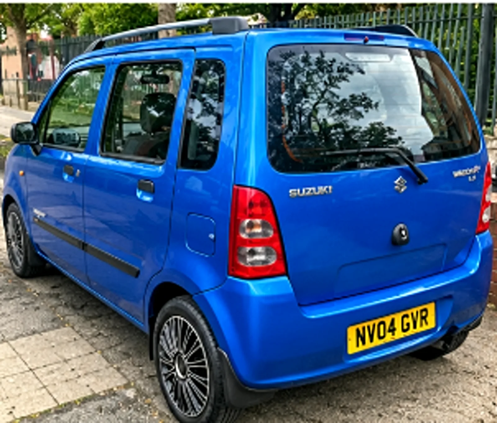 Suzuki Wagon R+ rear three quarter view in blue