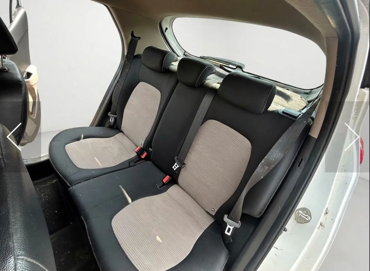 Hyundai i10 alternative front cabin view showing dashboard and gear lever