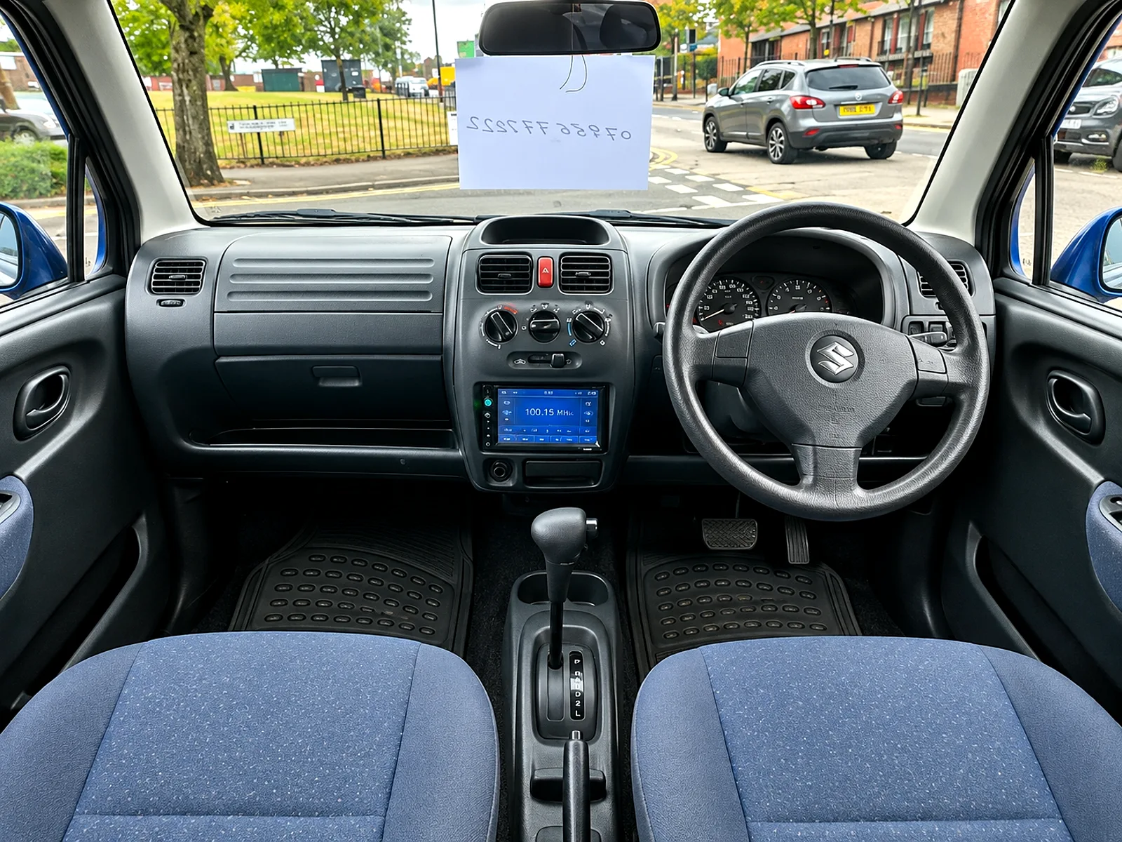 Suzuki Wagon R+ dashboard, automatic gear selector, air conditioning controls and stereo