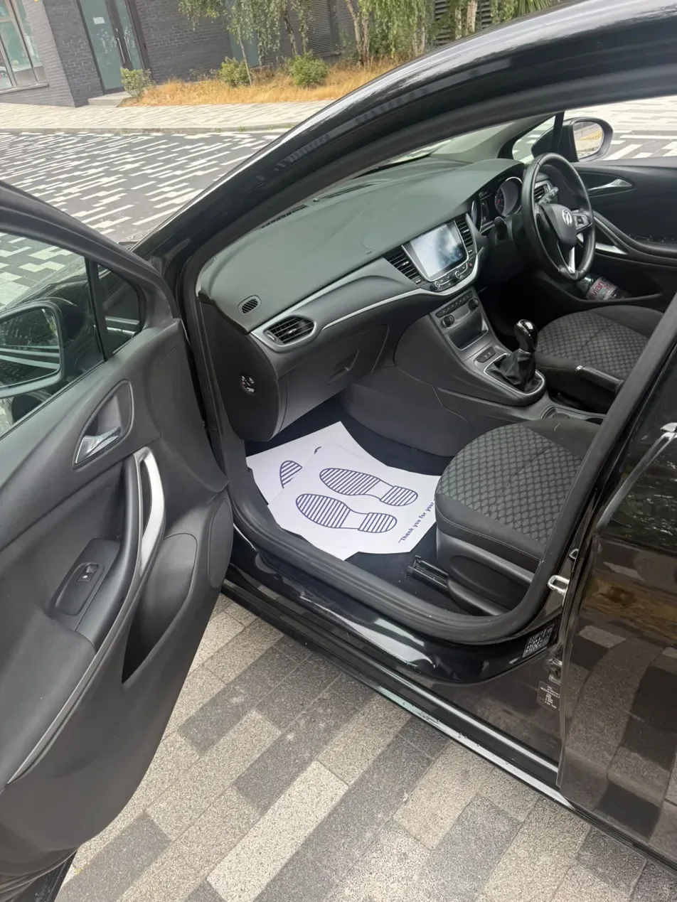 Passenger side interior showing dashboard and floor mats