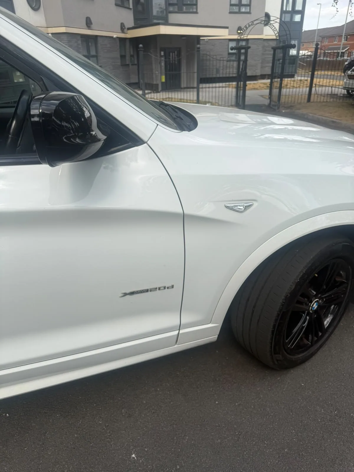 Side profile showing the xDrive 20d badging